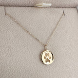 Waved Disc Imprint Pendant